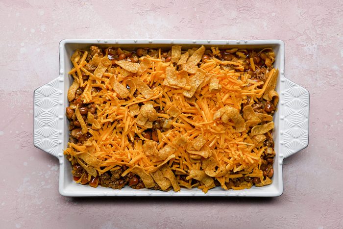 Sprinkle the reserved Fritos over the top