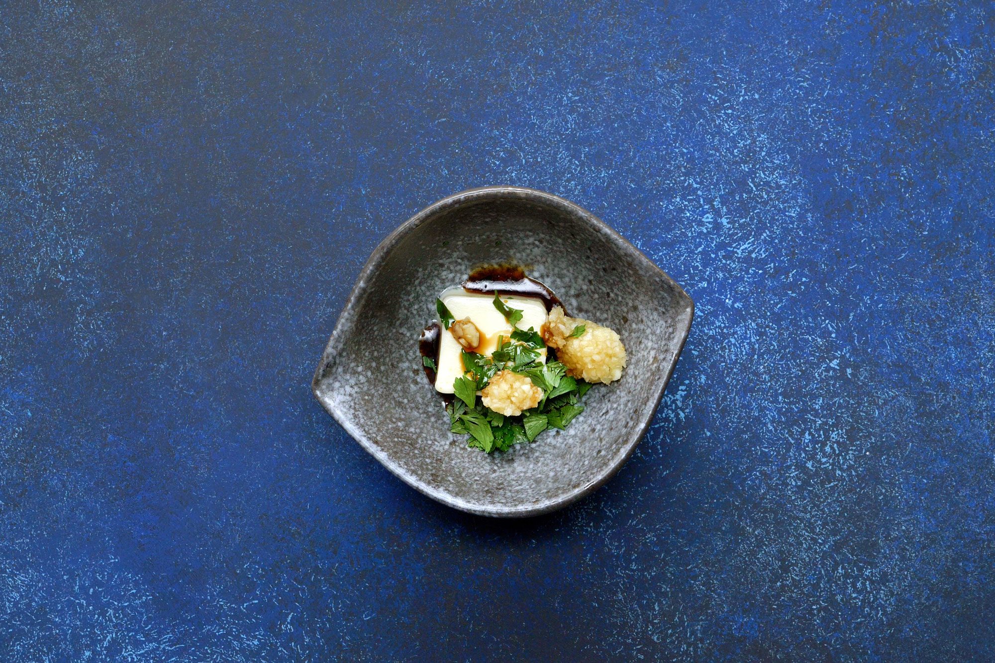 Mix 1 tablespoon of butter with parsley, garlic and soy sauce