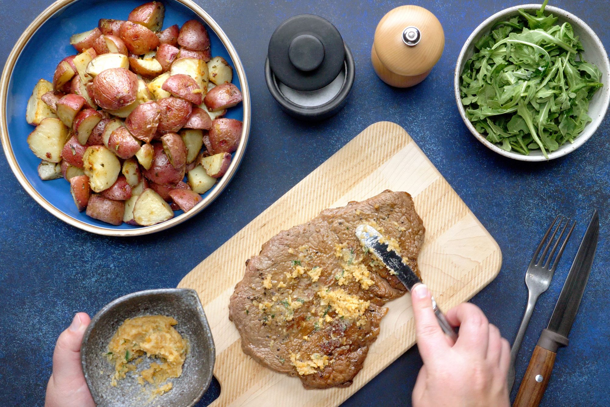 Top the steak with the garlic butter