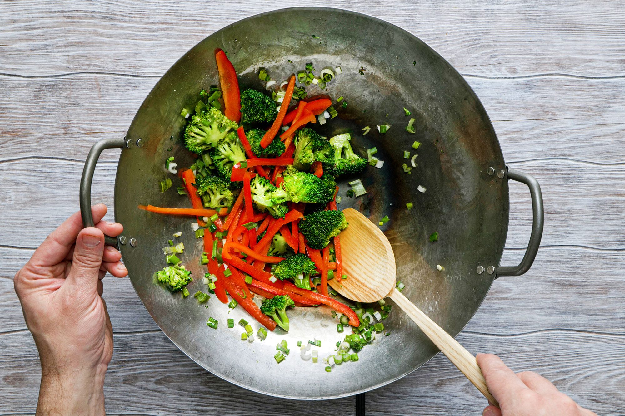 Stir-fry the vegetables in a large non-stick skillet