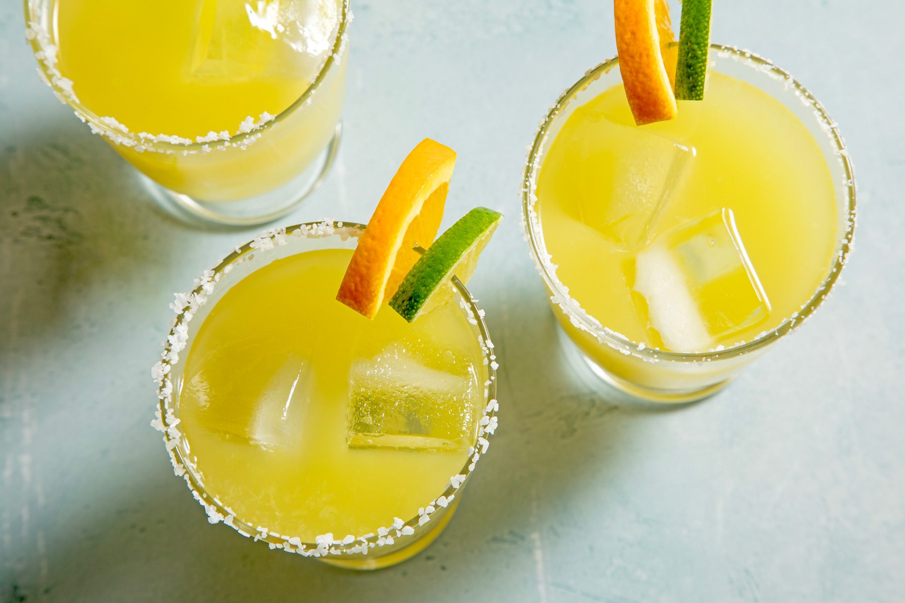 Skinny Margaritas garnished with a lime slice
