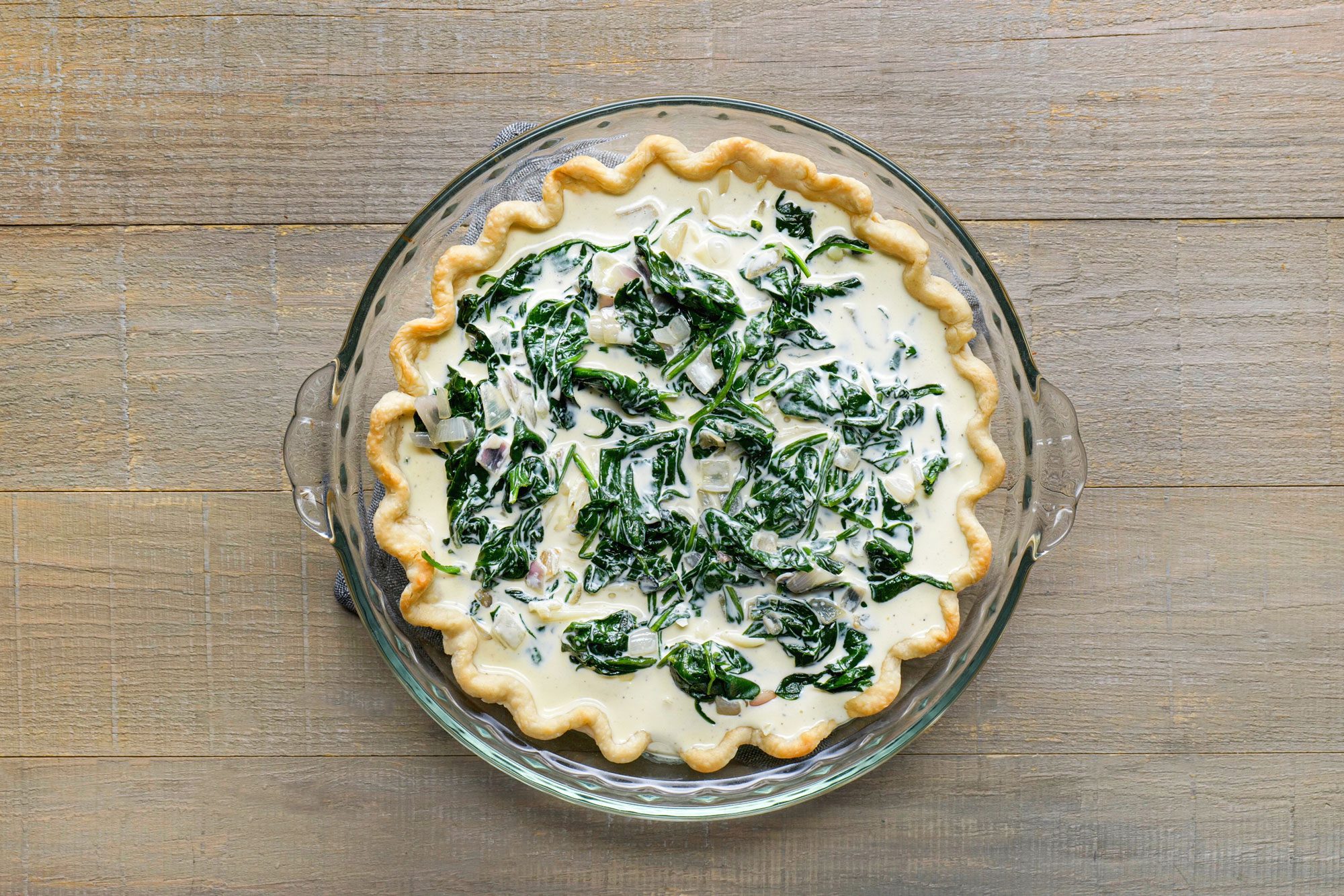 Carefully pour the egg mixture into the crust