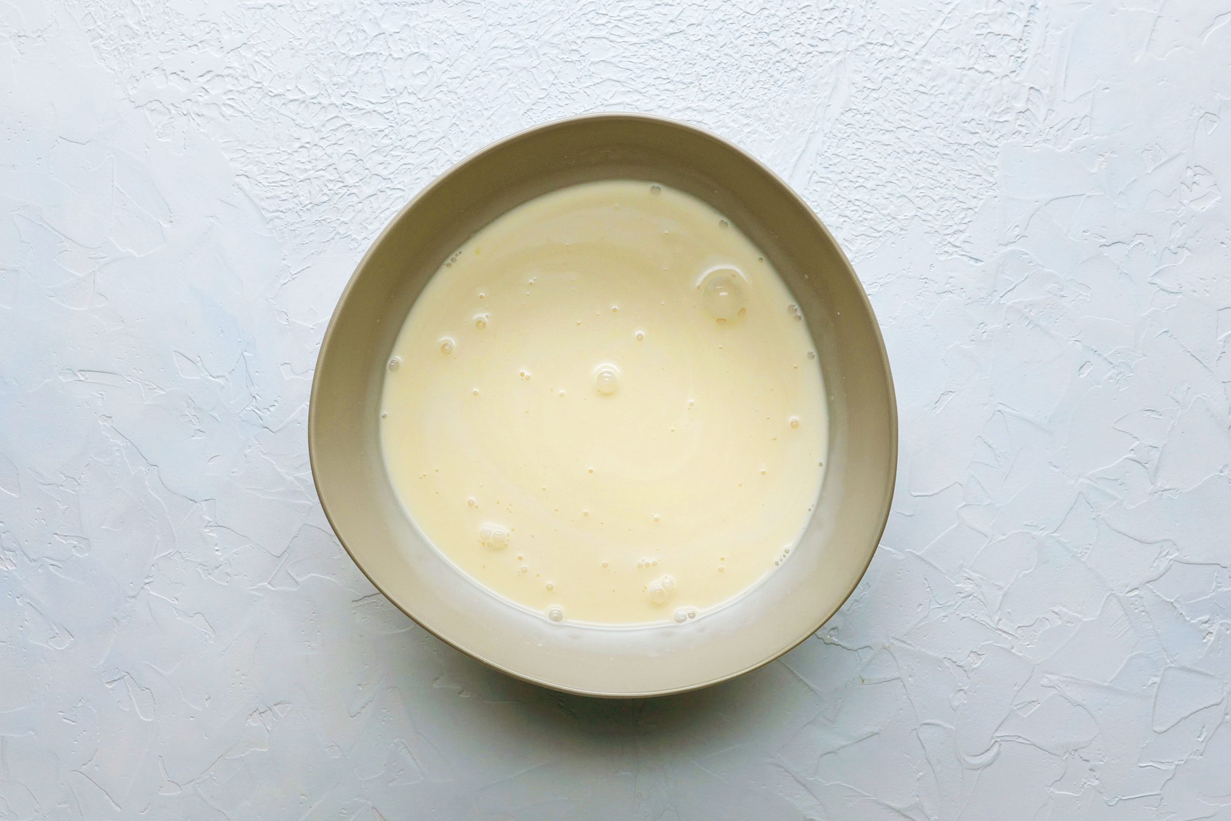Milk mixture for tres leches cake In a bowl