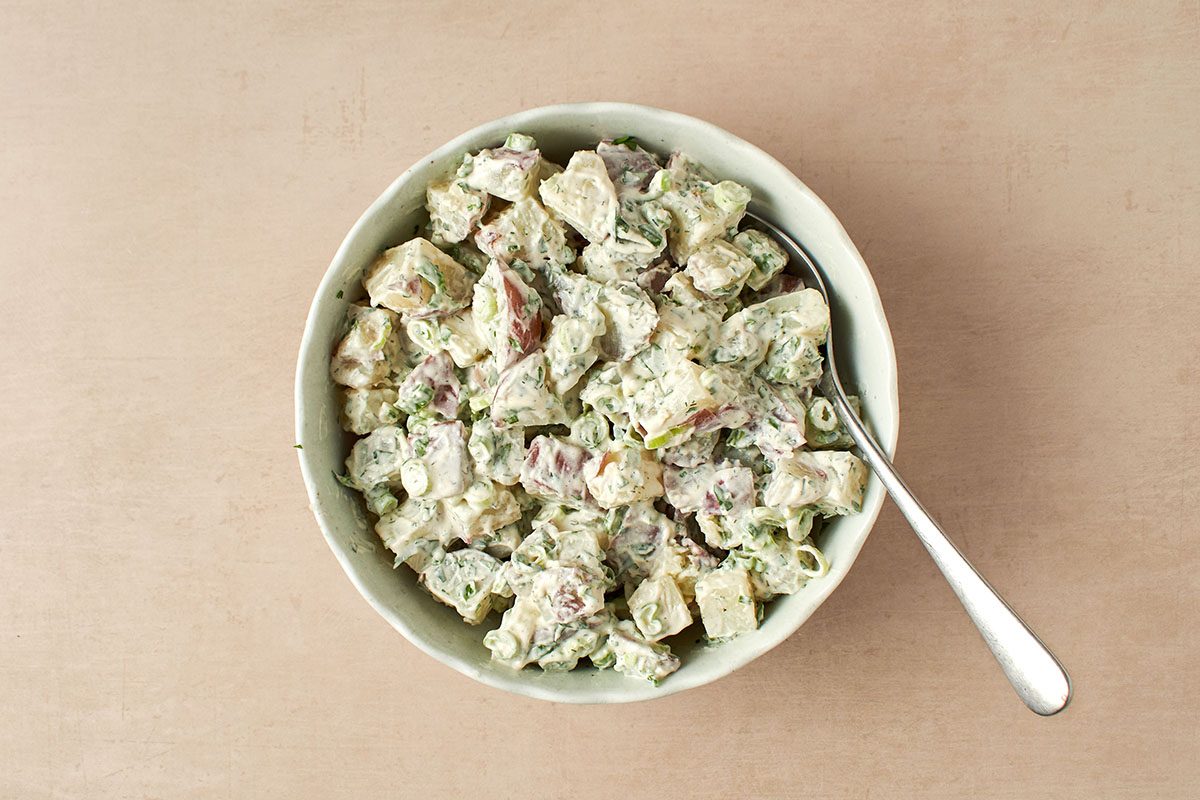 Combine wet ingredients with potatoes.