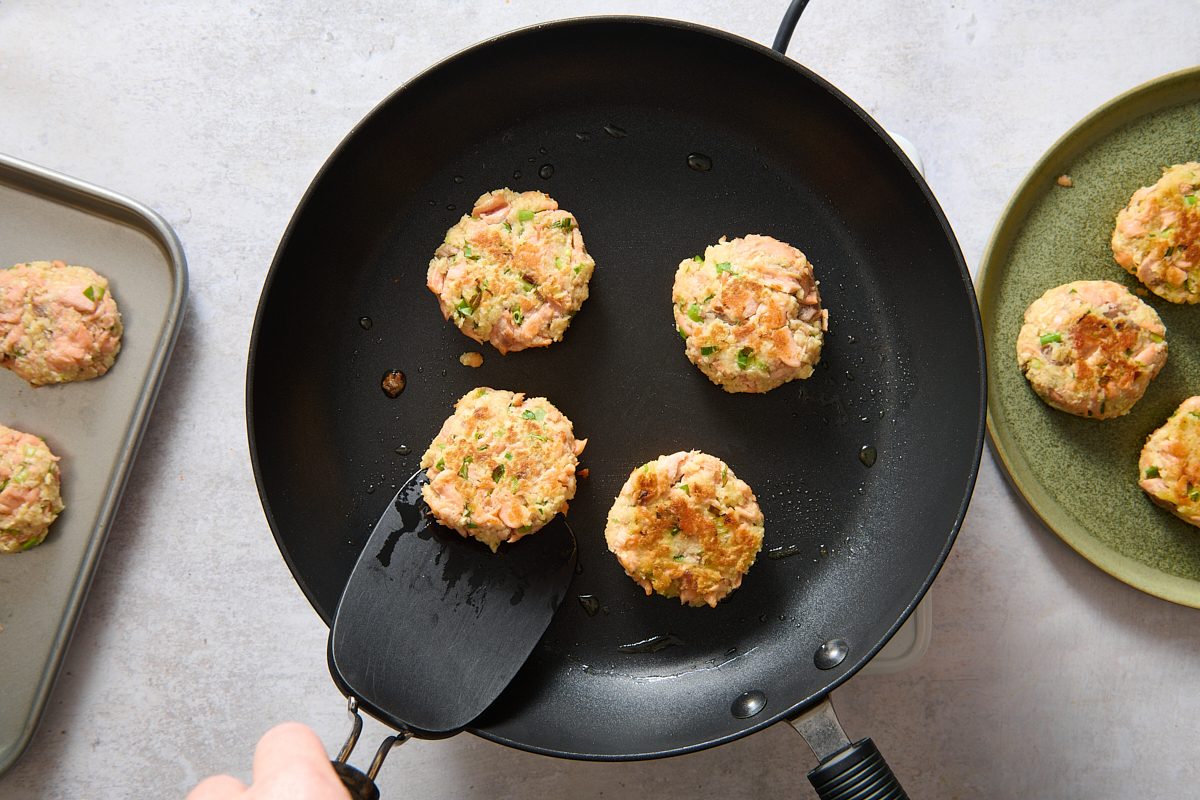 Cooking the salmon patties in a skillet