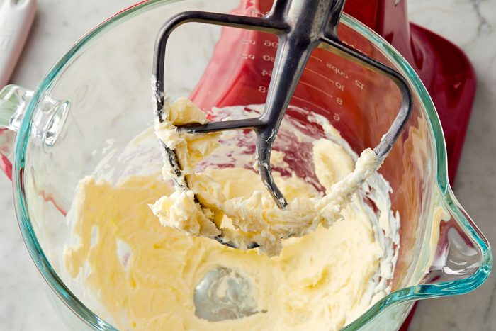 In another bowl, whisk flour, baking soda, cream of tartar, nutmeg and salt; gradually beat into creamed mixture.