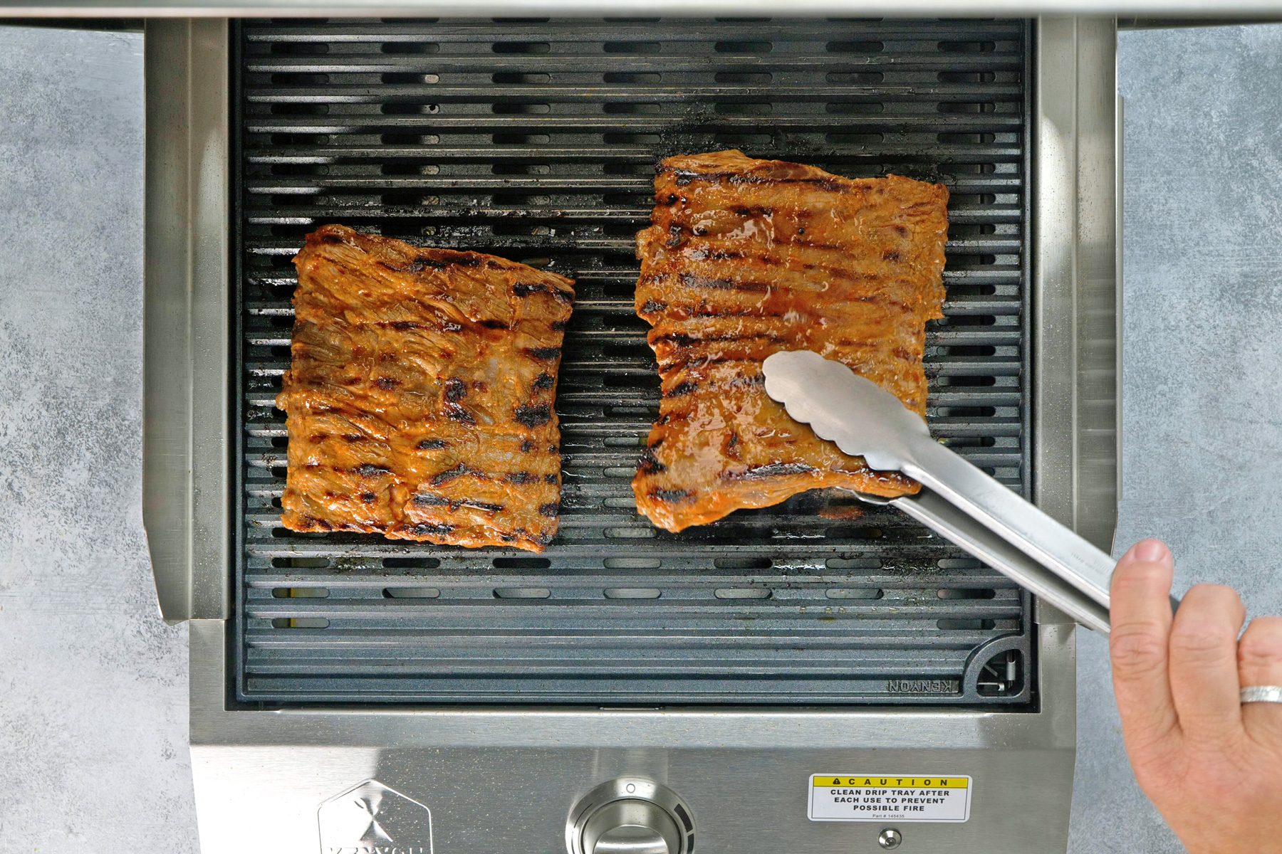 Grilling the marinated skirt steak