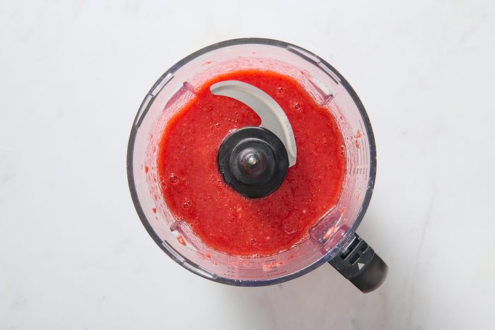 Strawberries blended in a food processor