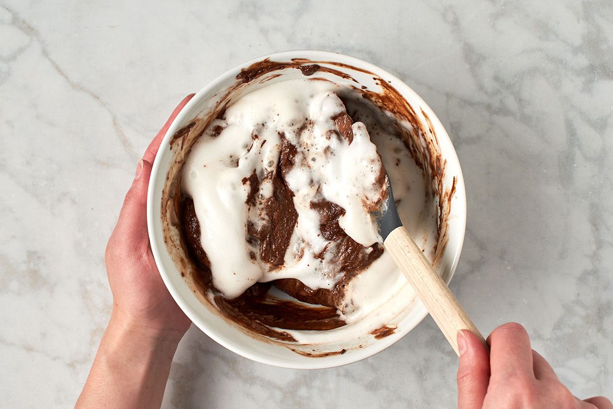 Fold in aquafaba into chocolate mousse