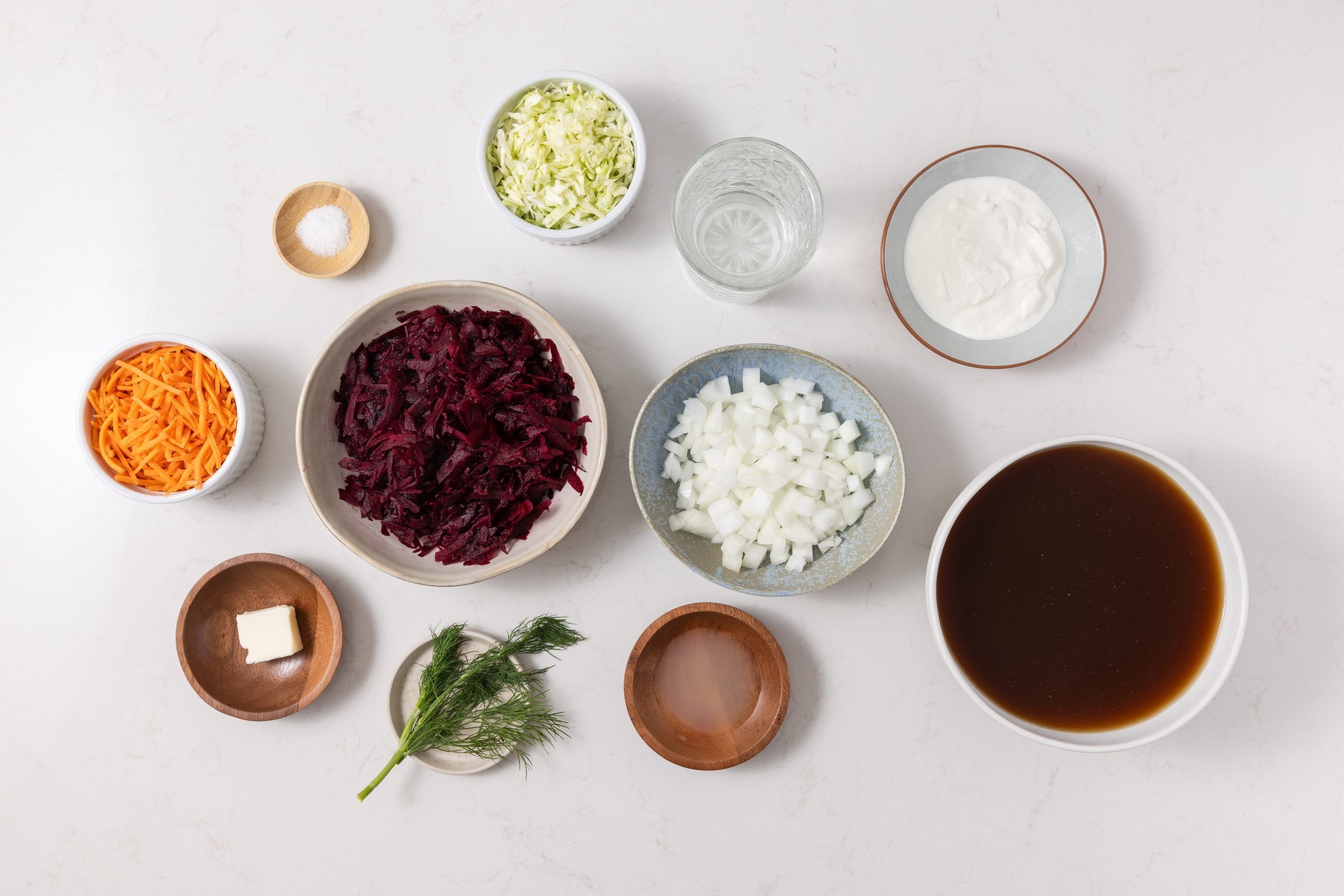 Ingredients for soup on kitchen counter.