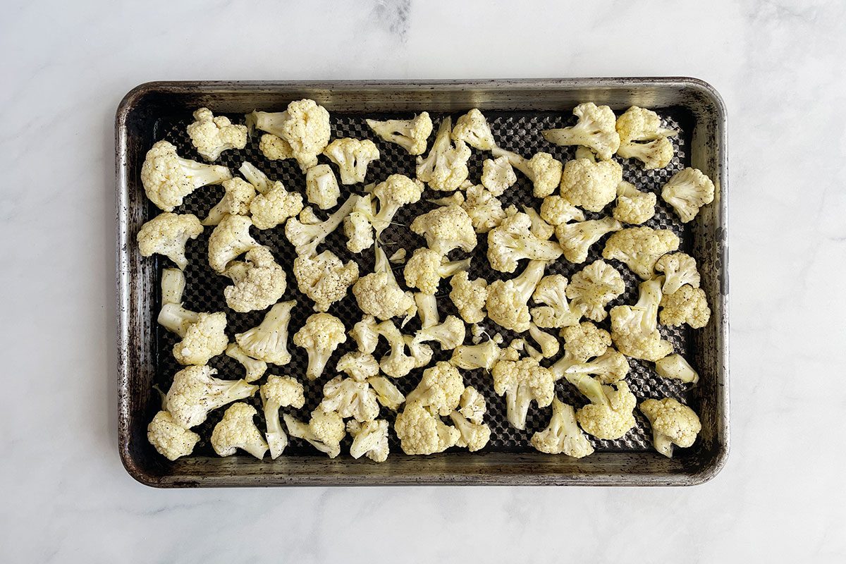 How to make Taste of Home's Cauliflower Gratin, step 1: roasting cauliflower on a baking sheet