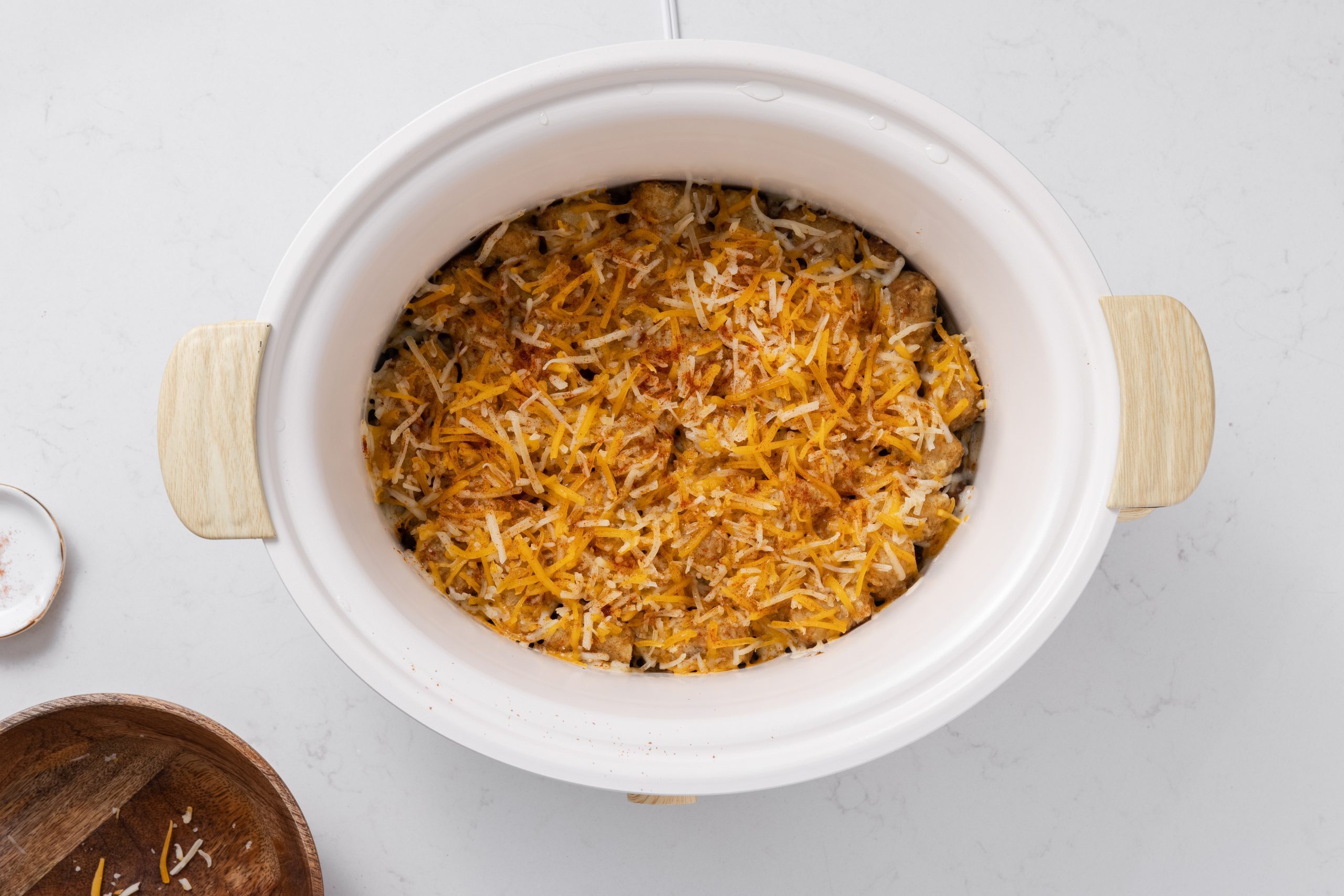 Casserole topped with cheese and paprika