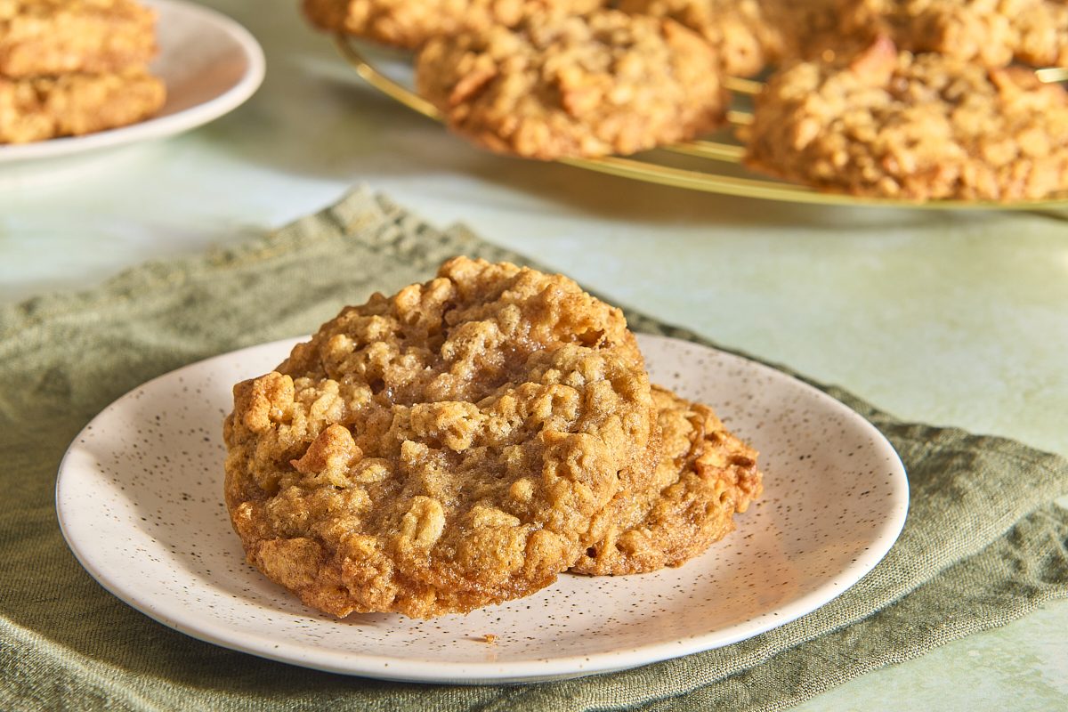 Closeup of two apple oatmeal cookies on a small plate