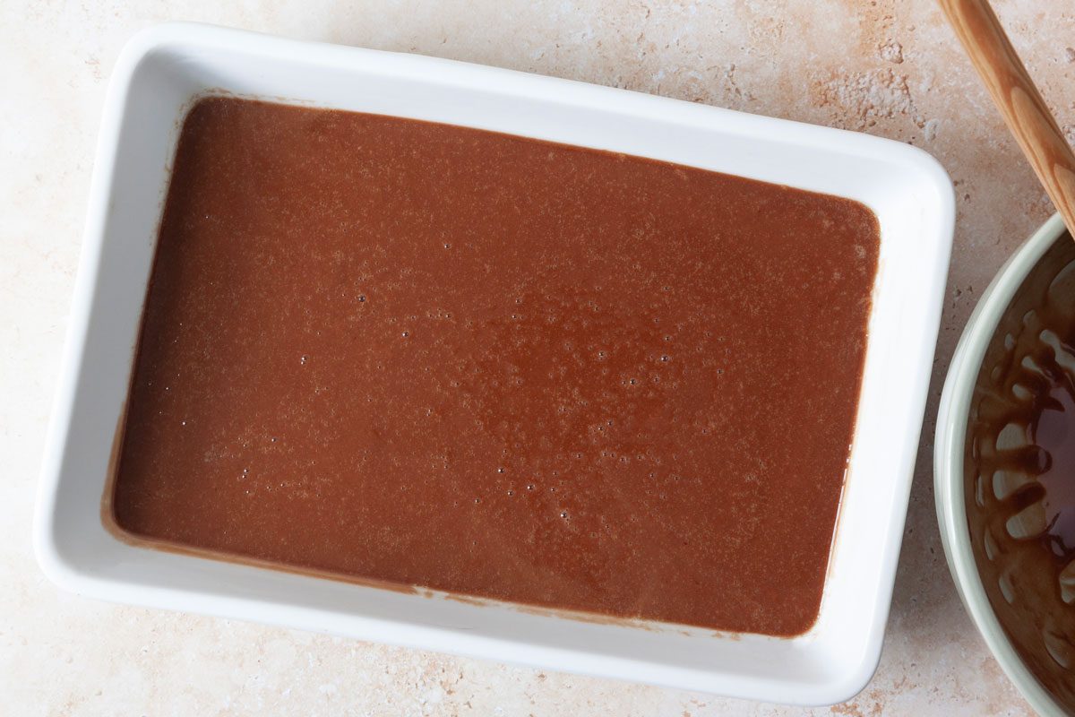 Step 3 of Taste of Home Buttermilk Chocolate Cake is to pour into a greased 13x9-in. baking dish. Bake at 350° for 30-35 minutes or until a toothpick inserted in the center comes out clean.