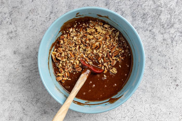 Taste of Home Chewy Brownie Recipe photo of combining the wet and dry ingredients.