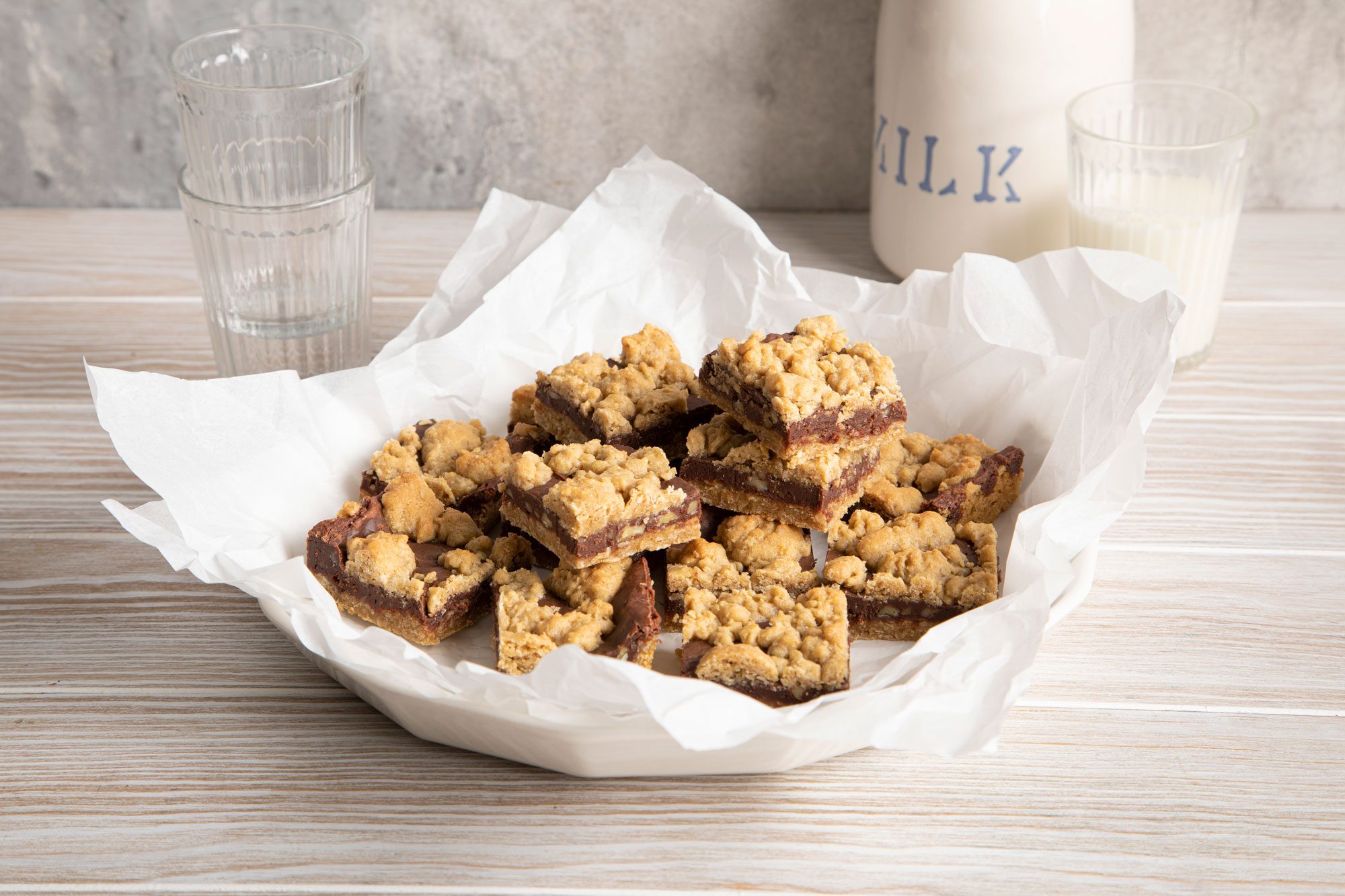 Chocolate Oatmeal Bars served in a plate with milk