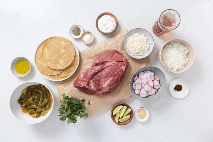 Ingredients for chuck roast tacos on kitchen counter.