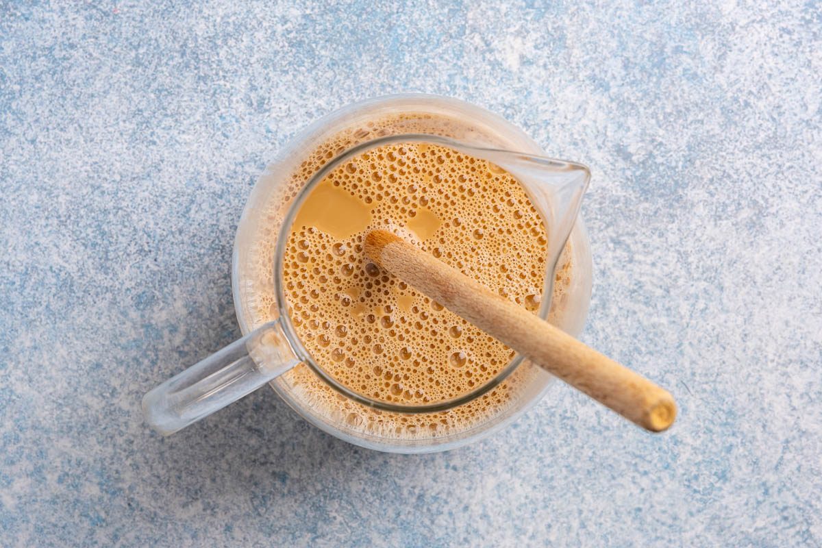 Taste of Home coffee punch recipe photo of mixing ingredients into carafe.