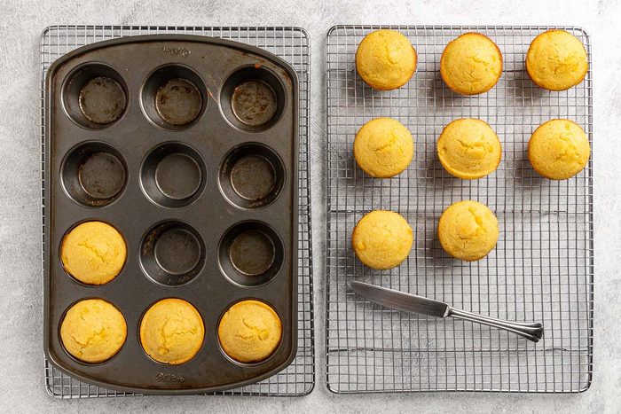 Taste of Home Corn Muffin Recipe photo of the muffins cooling on a cooling rack.