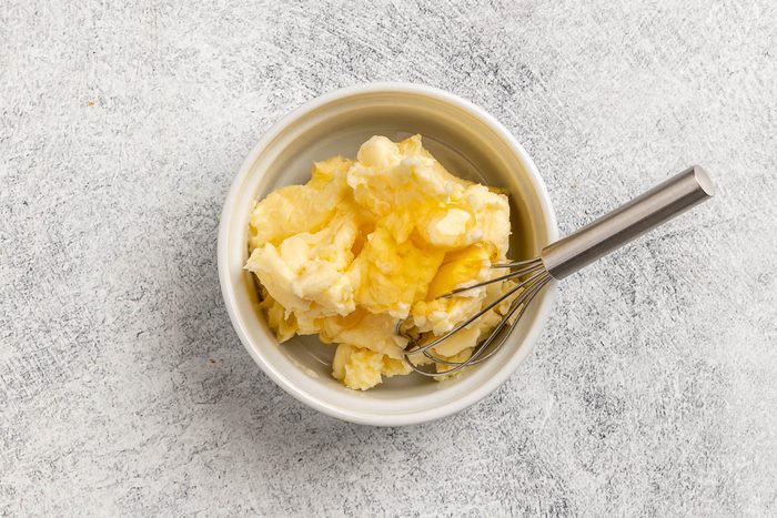 Taste of Home Corn Muffin Recipe photo of preparing the honey butter.