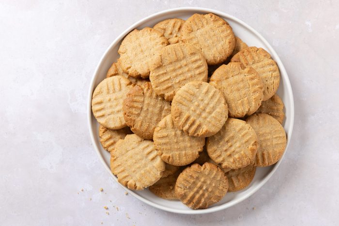 Cookies baked on white plate.