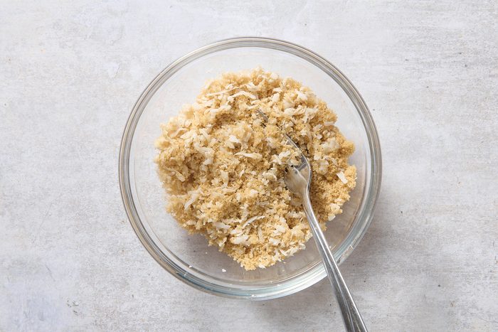 Mixing the topping in a small bowl