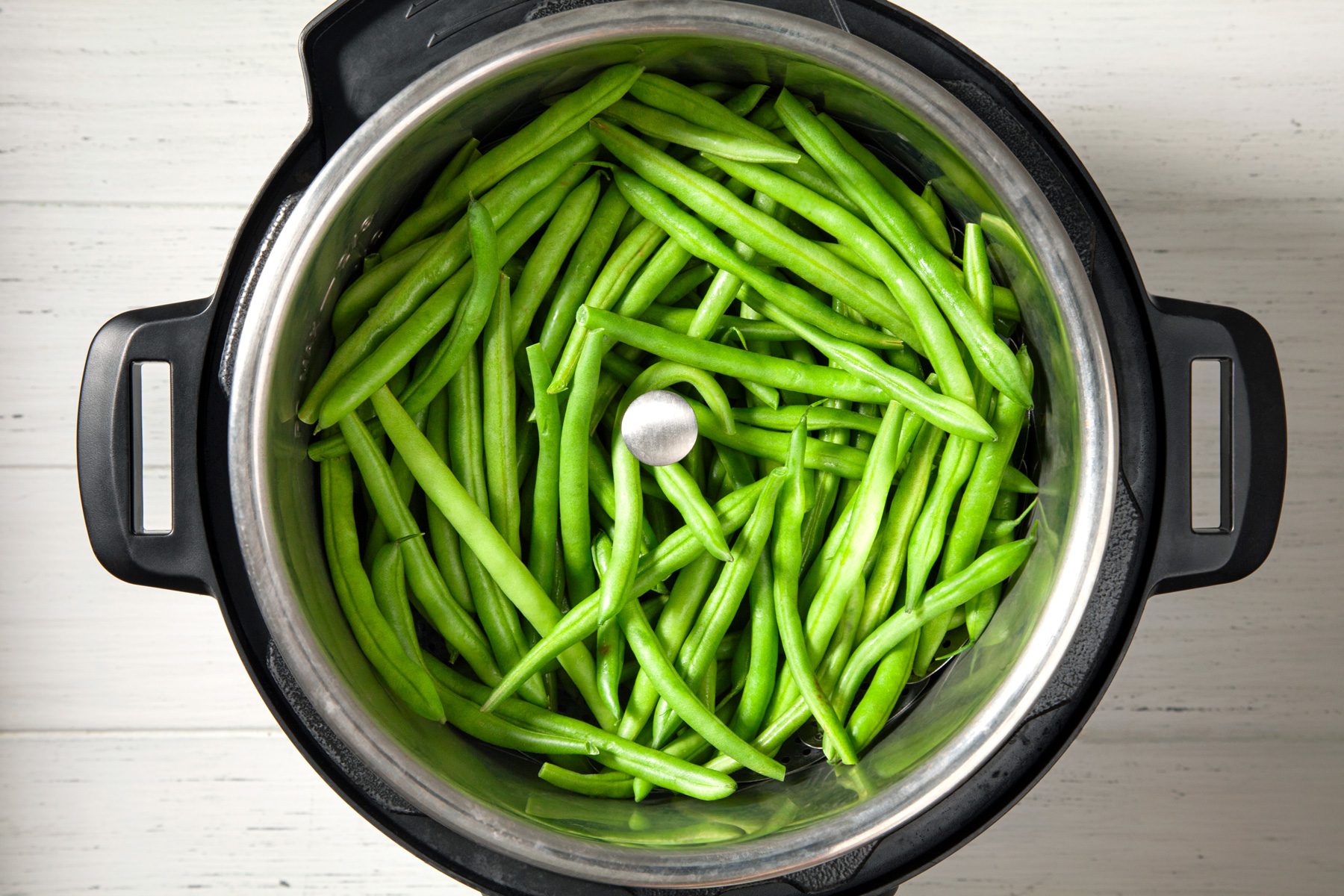 Top view shot of green beans in instant pot 