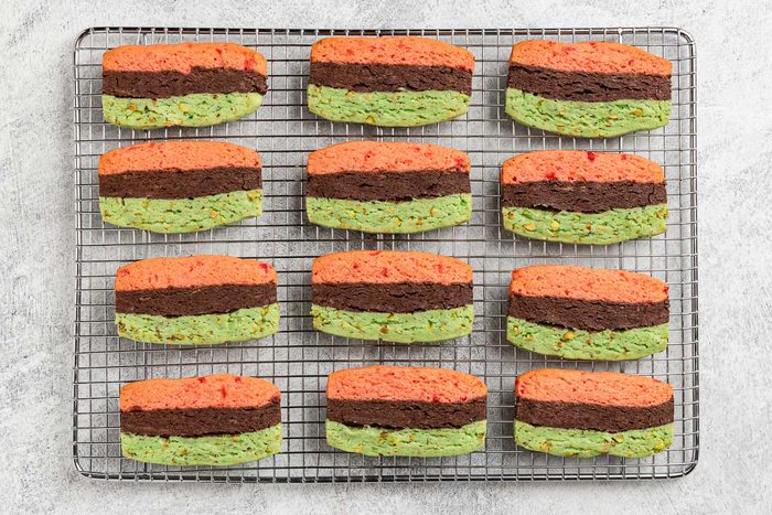 Taste of Home Italian Spumoni Cookies recipe photo of the baked cookies on a cooling rack.