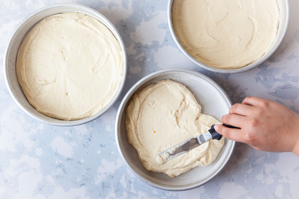 Step 2 of Taste of Home Italian Lemon Cream Cake is to Transfer to three greased and floured 8-in. round baking pans. Bake at 350°F for 14 to 18 minutes or until a toothpick inserted in the center comes out clean