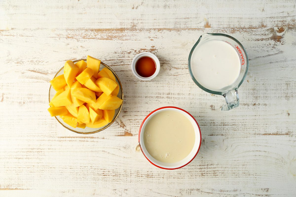 Ingredients laid out in bowls for Taste of Home's Mango Ice Cream.