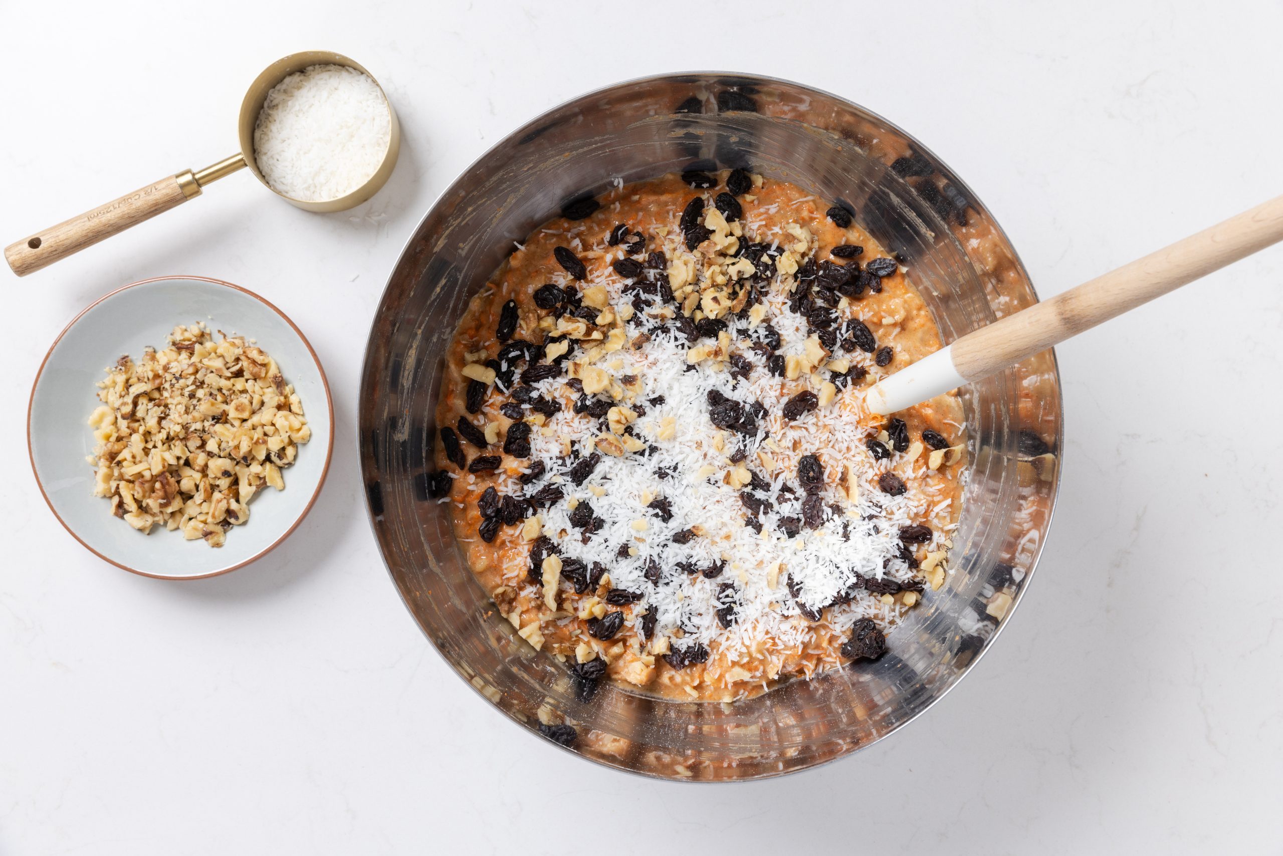 Morning glory muffins ingredients being mixed in.