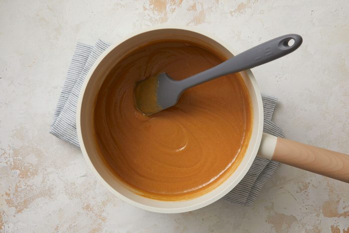Stir in peanut butter and vanilla until smooth