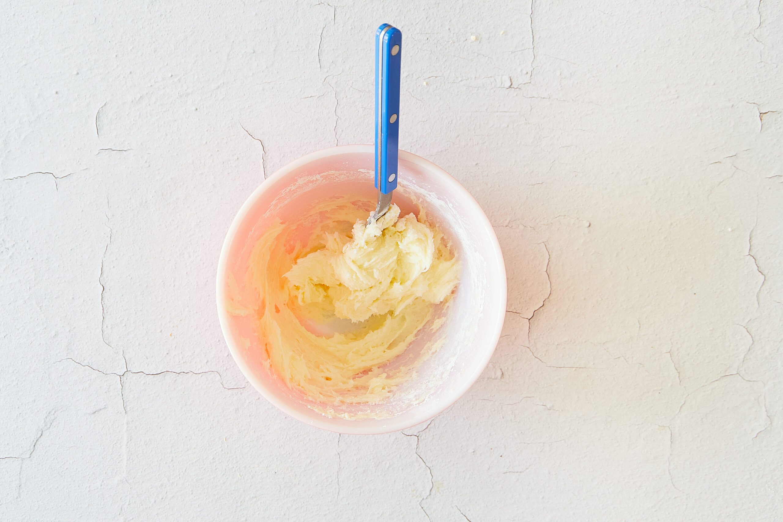Make the frosting for the apple walnut cake.