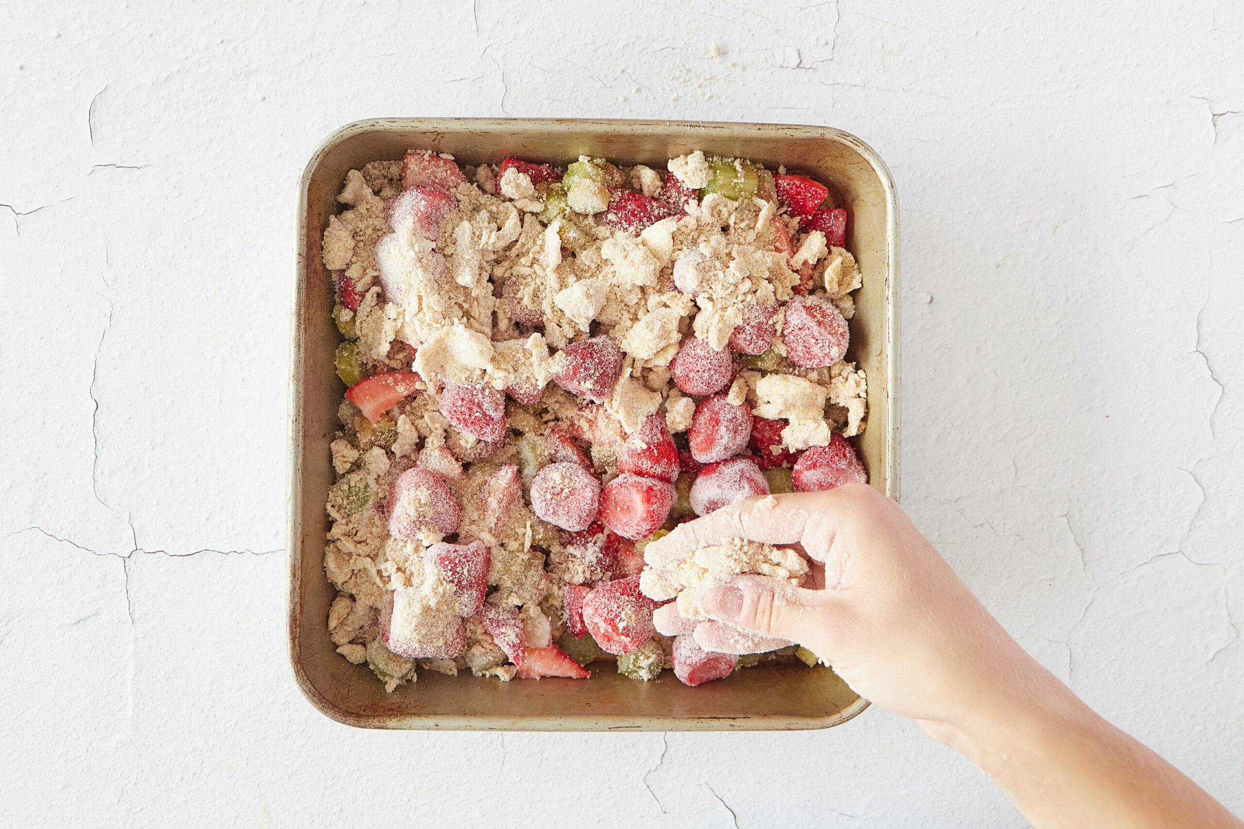 Assemble the strawberry rhubarb crumble.