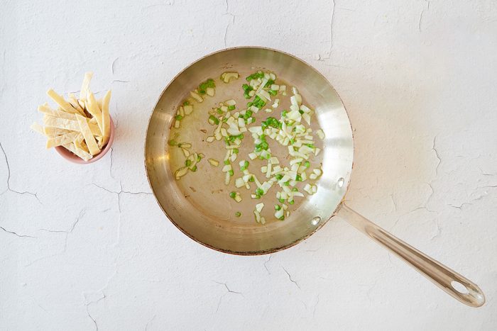 Cook the vegetables for breakfast tacos