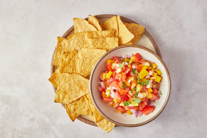 Peach Mango Salsa served with tortilla chips on the side