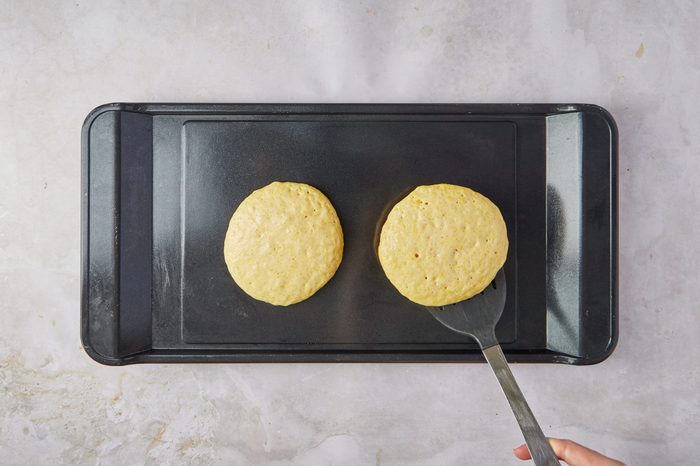 Cook the cornbread pancakes on a griddle.