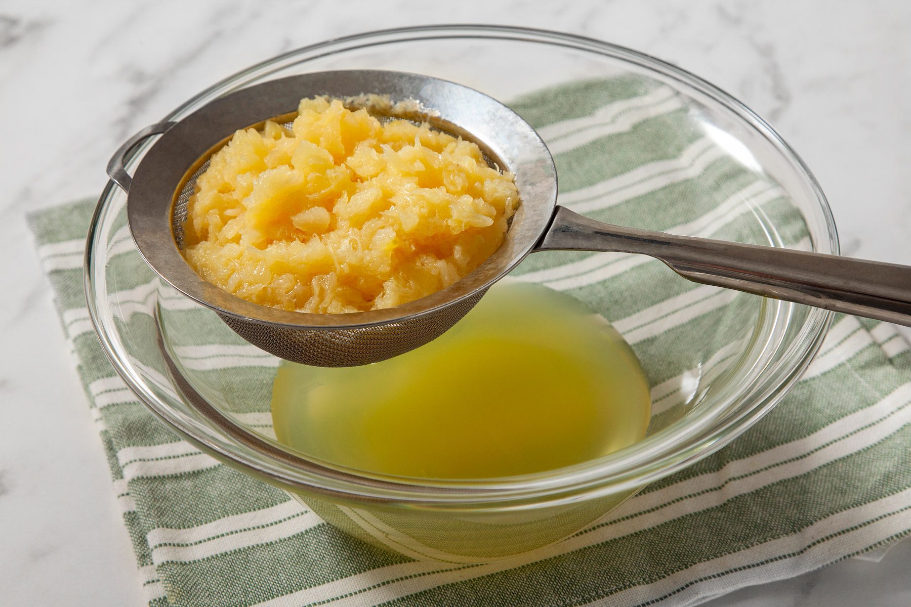 pineapple juice drained in a bowl.