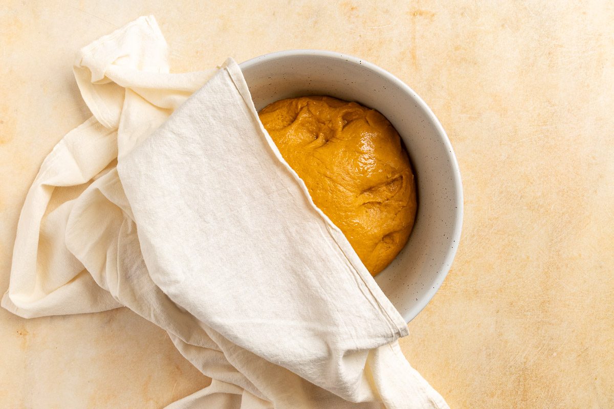 Taste of Home Pumpkin Cinnamon Rolls recipe photo of the dough rising.