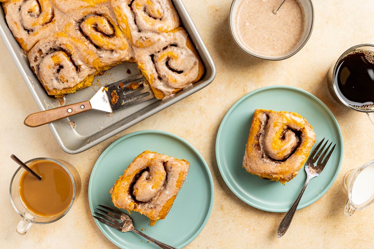 Taste of Home Pumpkin Cinnamon Rolls recipe photo of the finished recipe served on plates.
