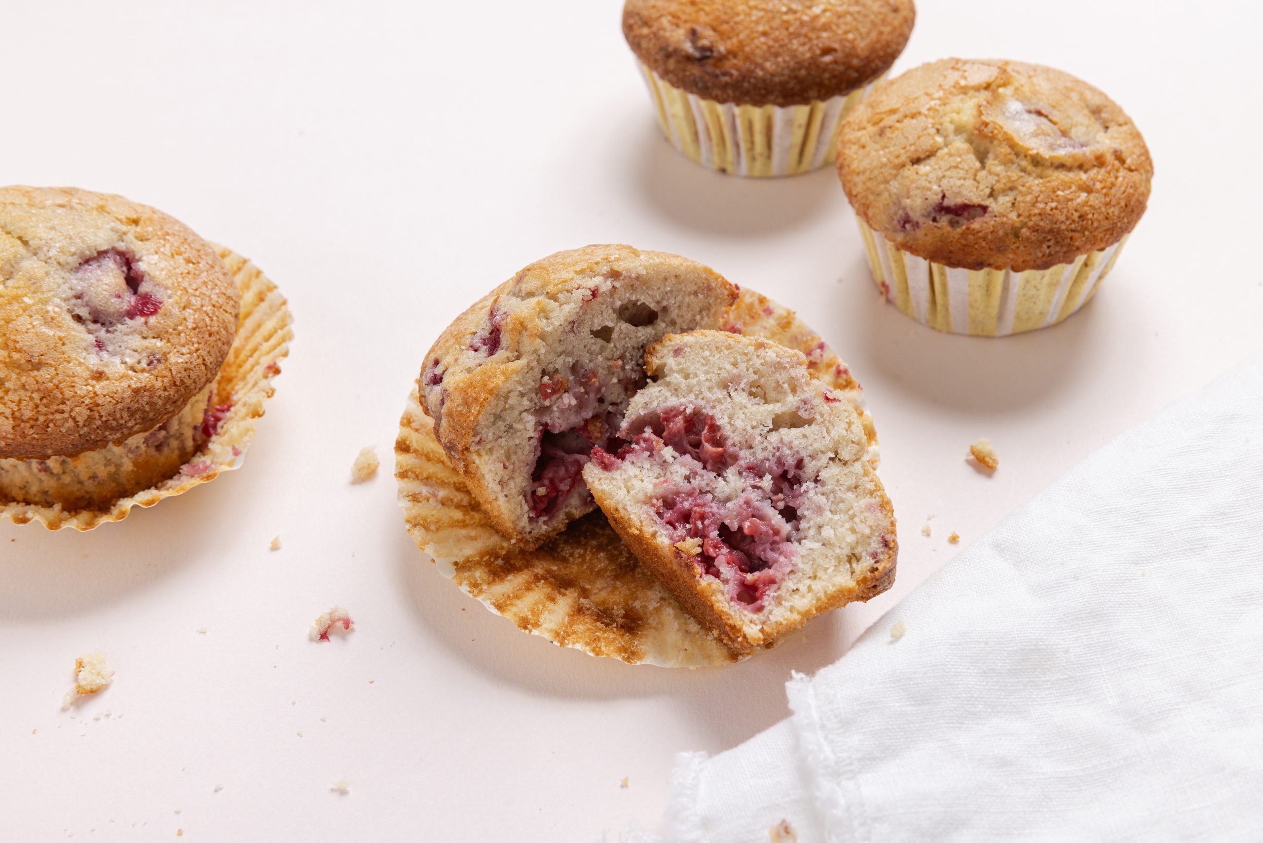 Detail of muffin cut in half showing it inside.