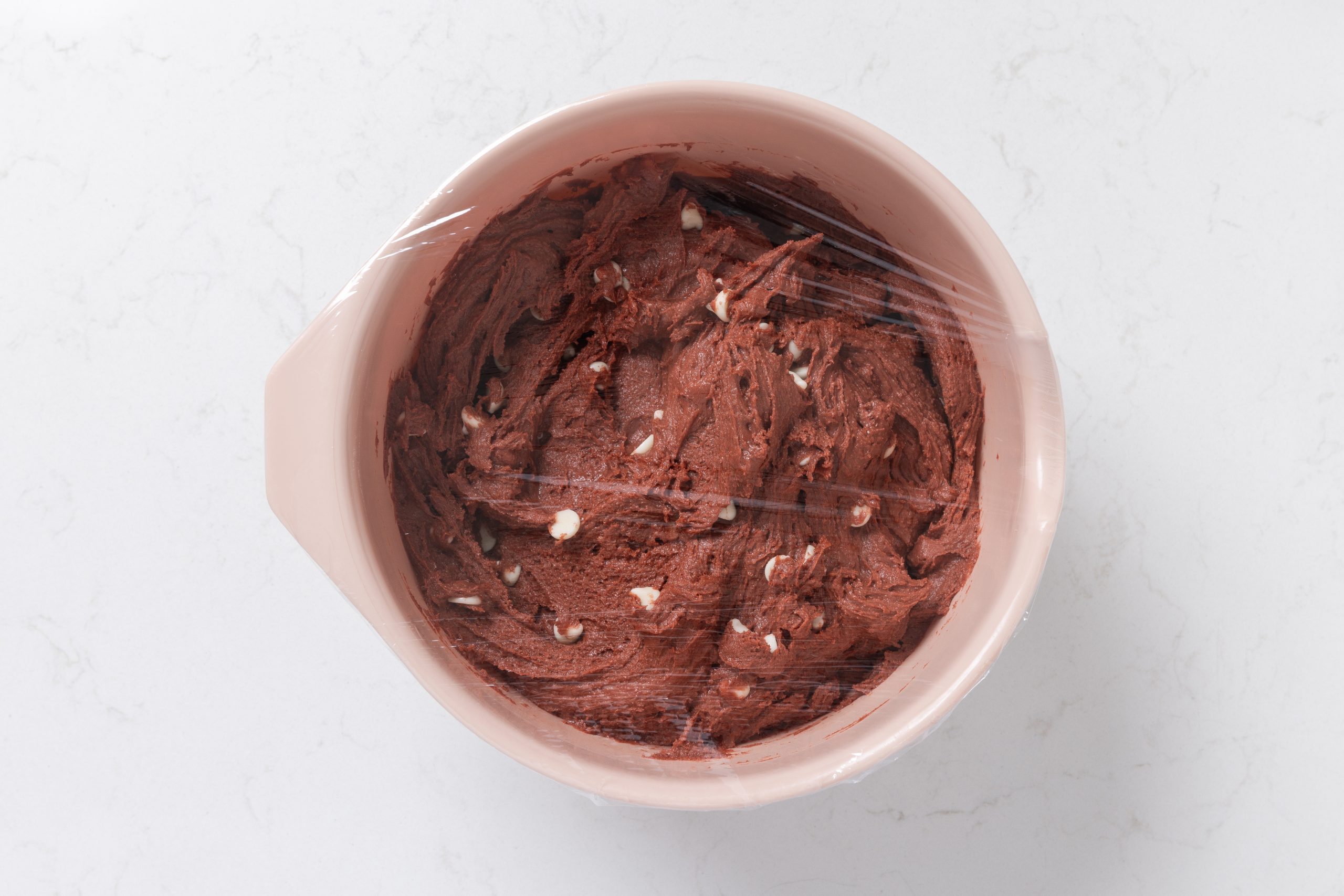 Cookie dough covered and ready to be refrigerated.