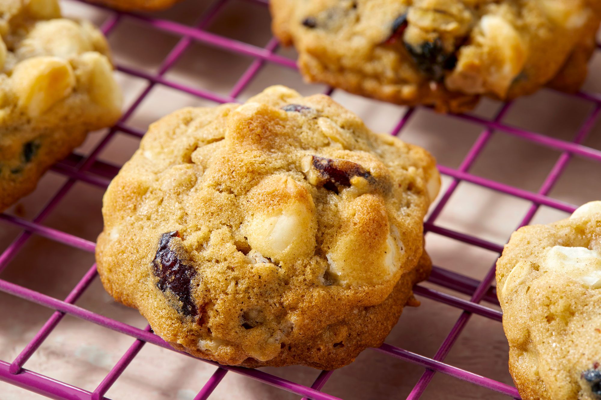 Close Shot of White Chocolate Cranberry Oatmeal Cookies on Cooling Rack