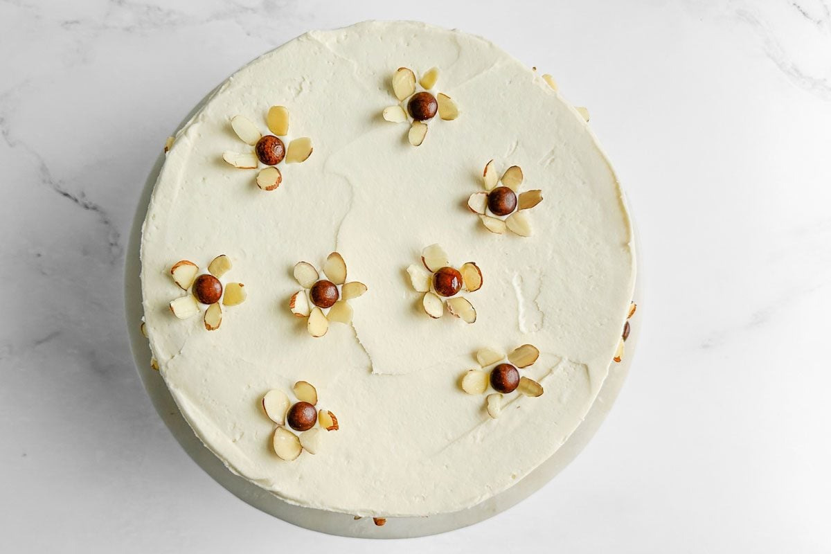 Taste of Home Amaretto Cake on a cake stand