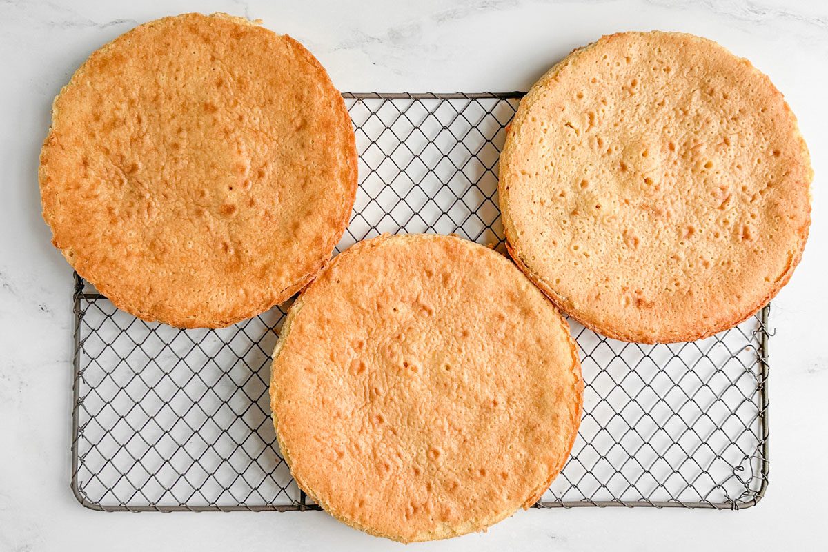 Cake layers for Taste of Home Amaretto Cake on a wire rack