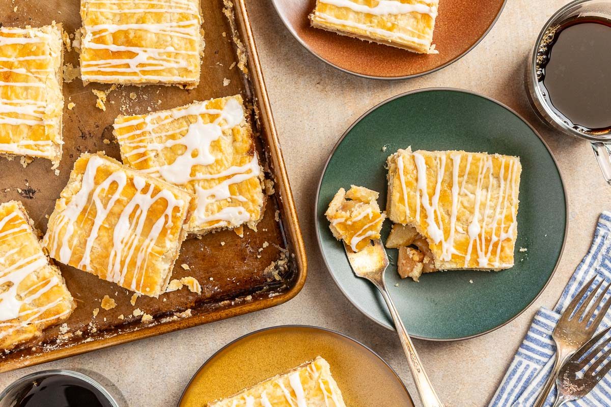 Taste of Home Apple Danish recipe photo of finished recipe cut into sqauares and served on plates.