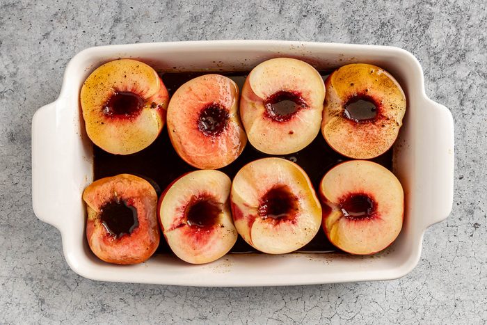 Taset of Home Baked Peaches photo of the glaze poured over the peaches.
