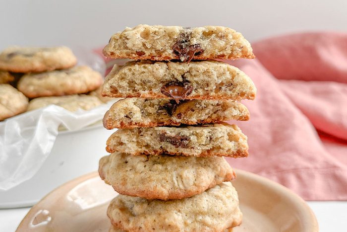 Taste Of Home Banana Oatmeal Cookies Stacked On A Pink Ceramic P