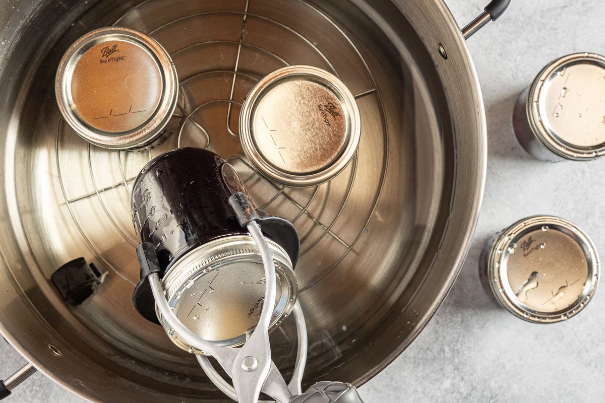 Taste of Home Blueberry Jelly Recipe photo of processing the jars in a water bath.