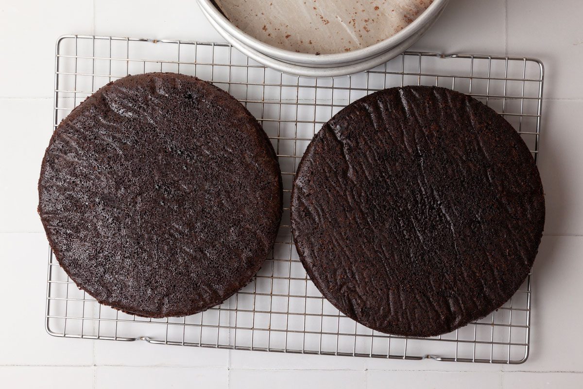 Step 3 of Taste of home Brooklyn Blackout Cake is to Transfer the batter to prepared pans. Bake for 35 to 40 minutes or until a toothpick inserted in the center comes out clean. Cool in the pans for 10 minutes before removing to wire racks; remove the parchment. Cool completely.